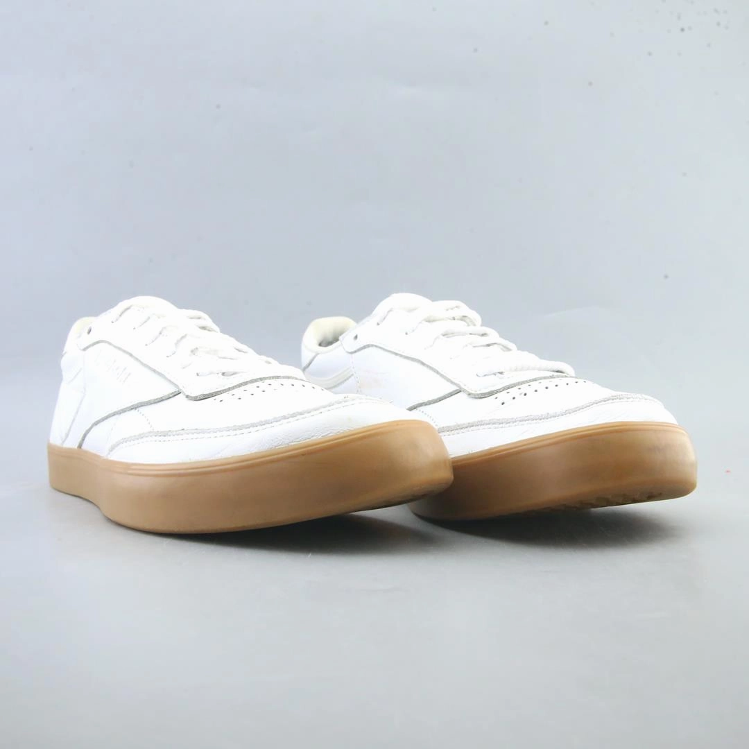 Casual Canvas Shoe Crossword Clue REEBOK CLUB C 85 FVS