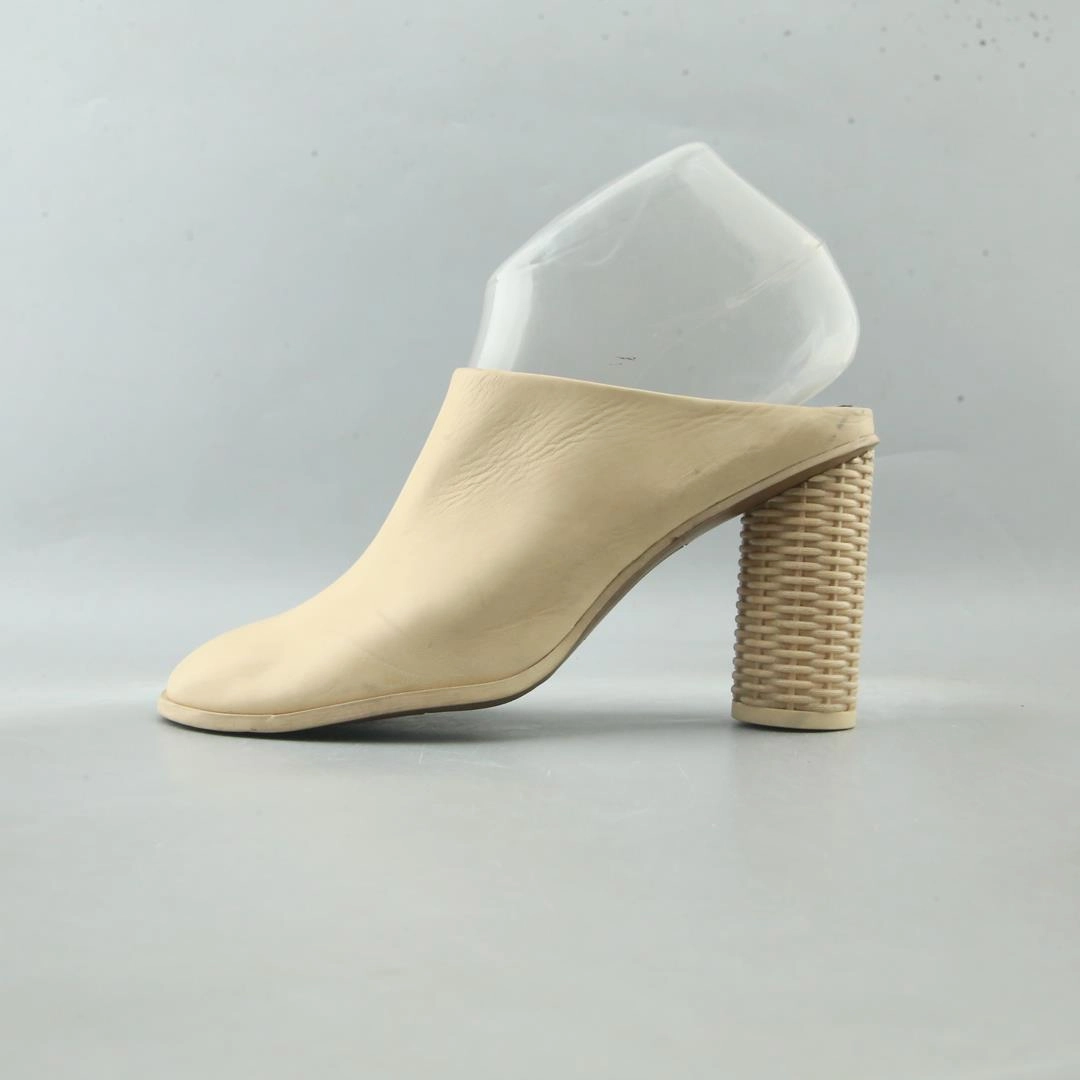 FRANCO SARTO . High Heels And Short Skirt