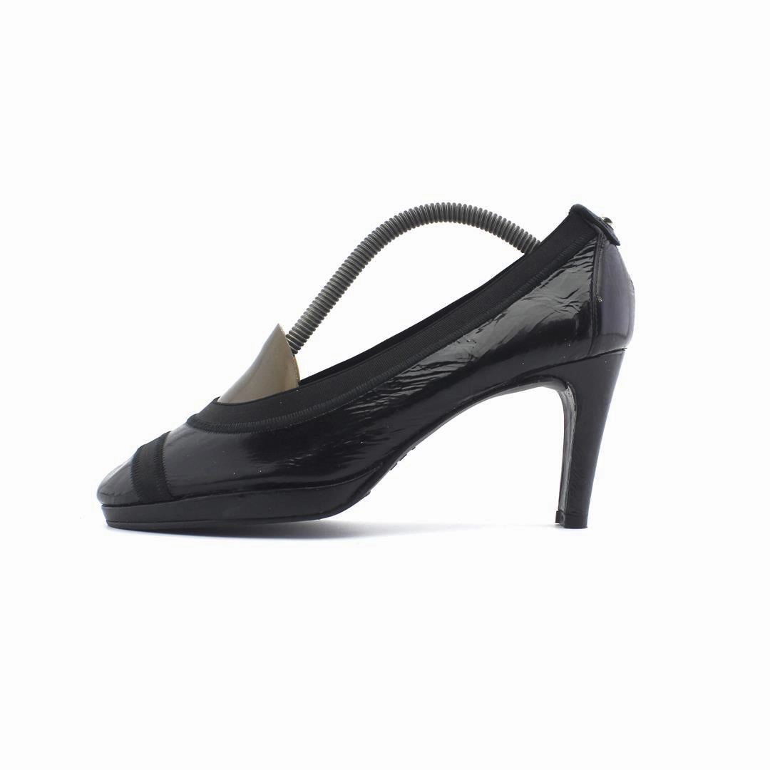 STUART WEITZMAN . Houndstooth High Heels